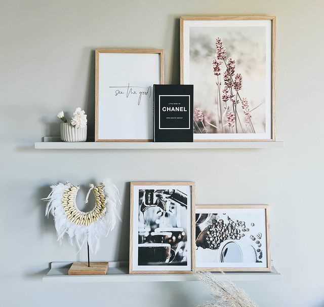 Posters on display shelves